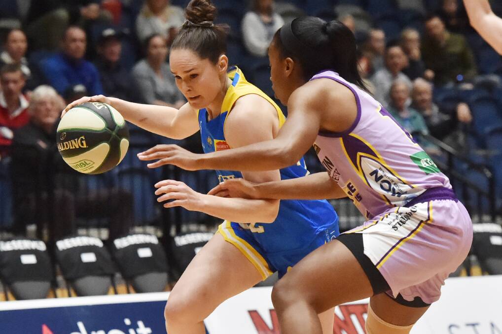 SUPER COMPETITIVE: Kelly Wilson is a picture of concentration in an early season game against the Melbourne Boomers. Picture: DARREN HOWE