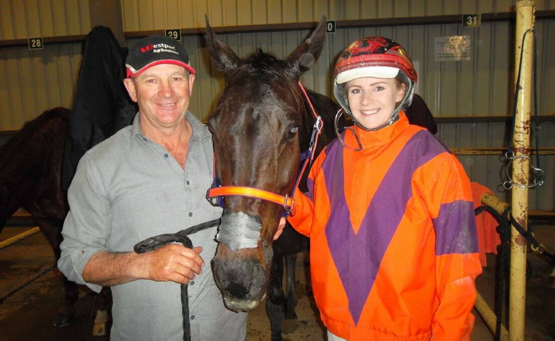 WINNING COMBINATION: Colin Godden and Tayla French teamed up for a win at Shepparton with veteran pacer Lights And Music. Picture: SHEPPARTON HARNESS RACING CLUB