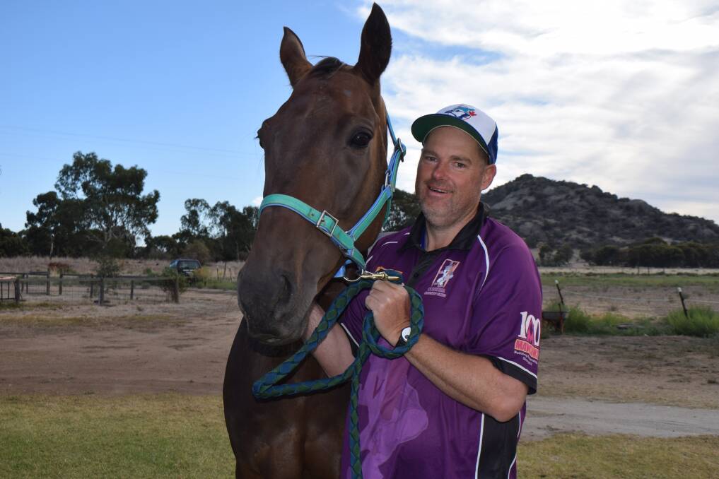 MAIDEN TRAINING WIN: Chris Cain with recent Echuca winner Travelnpastyou on his family's property at Pyramid Hill. Picture: KIERAN ILES