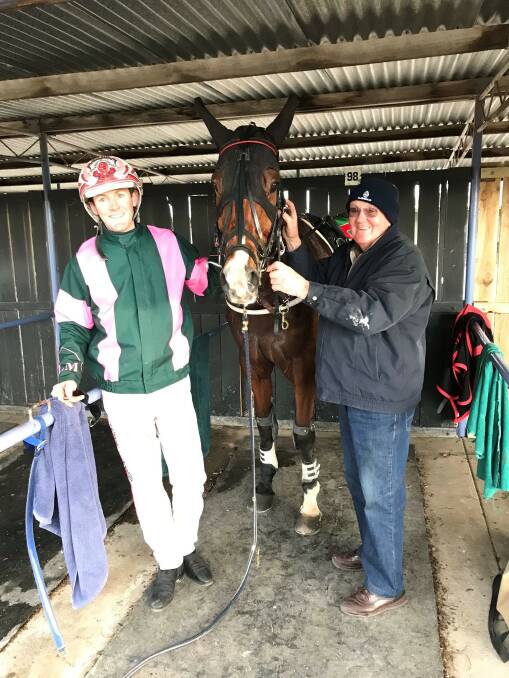 Junortoun trainer Len Maher and Chris Svanosio with Declan Henry following the eight-year-old trotter's 'special' win at Maryborough on Monday.