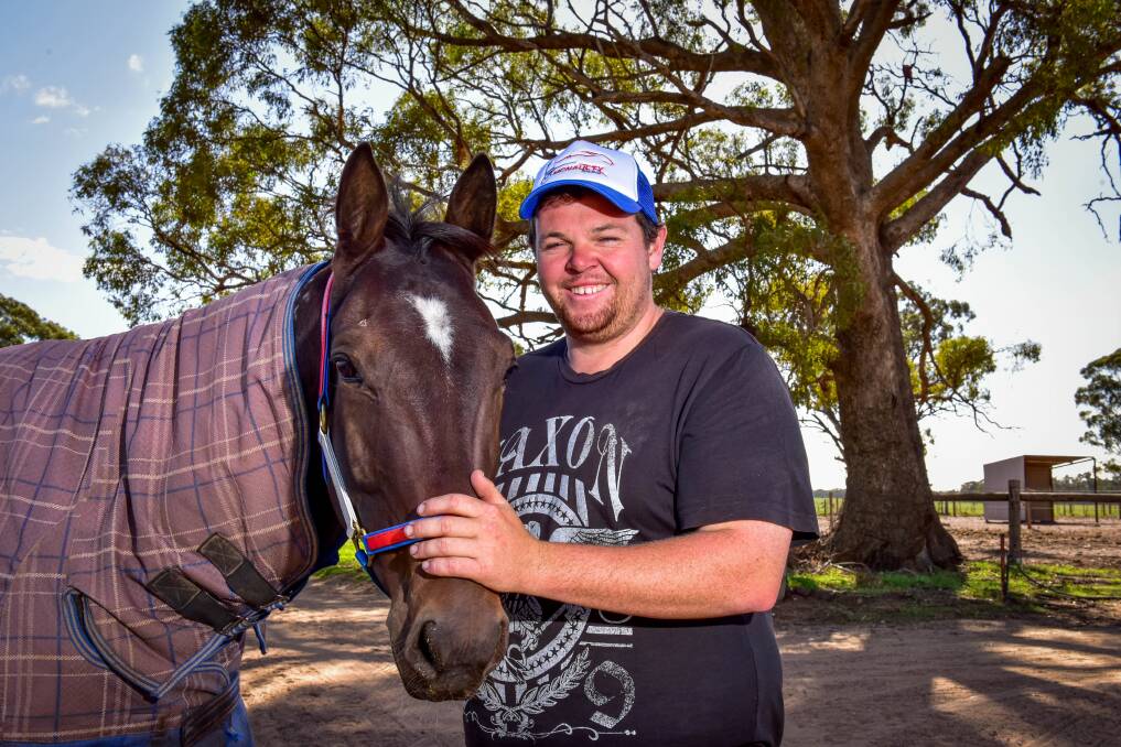 A WELL DESERVED PAT: Trainer Shaun McNaulty with Hashtag, on the morning after the six-year-old gelding equalled the track record at Lord's Raceway on Wednesday. Hashtag was driven to victory by Rod Lakey. Picture: BRENDAN McCARTHY