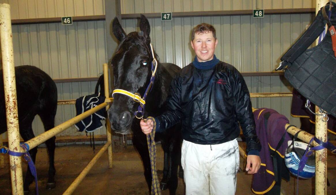 Alex Ashwood and Dynamite Dozer following the four-year-old's win at Shepparton on Monday. Picture: SHEPPARTON HARNESS RACING CLUB