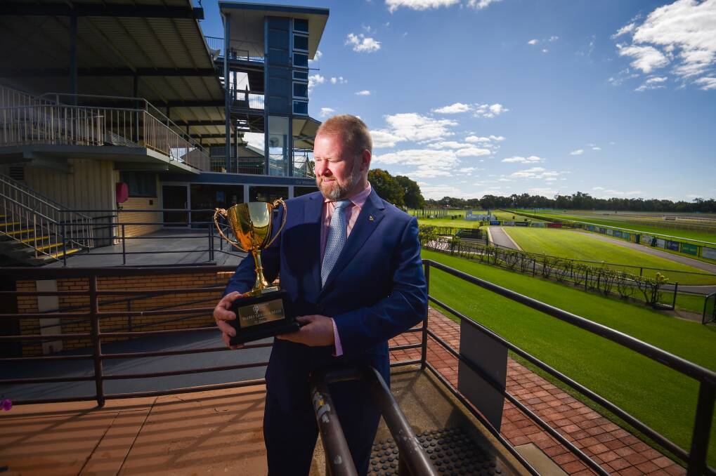 Bendigo Jockey Club chairman Jack Lyons with the Golden Mile trophy Picture by Darren Howe