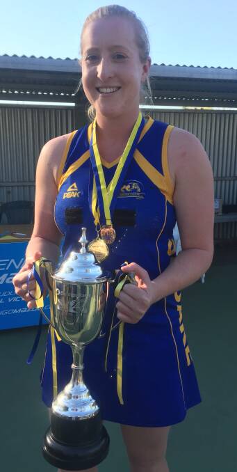Allira Hammond with the 2015 A-grade netball premiership cup, won by Golden Square. Picture: KIERAN ILES