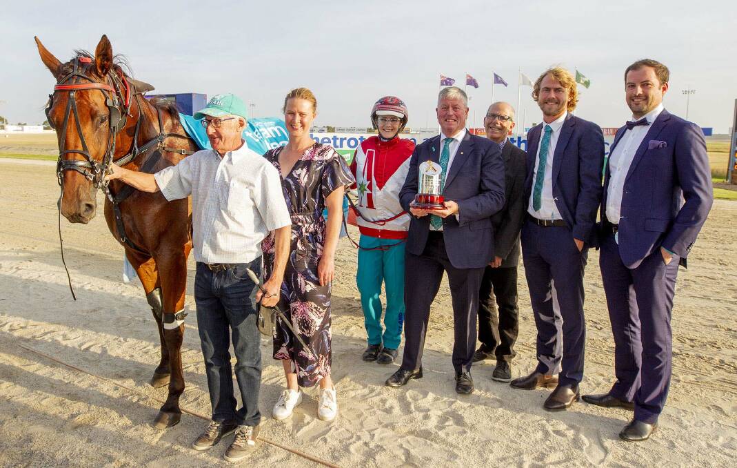 The connections of Aldebaran Alissa, including owner Duncan McPherson (fourth from left) and winning driver Tayla French, savour a special win at Tabcorp Park Melton. Picture: STUART McCORMICK
