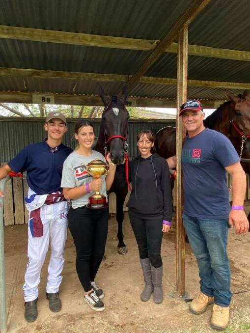 Ryan, Abbey, Naomi and Shane Sanderson with their Ouyen Pacing Cup winner Blaster Ranger.