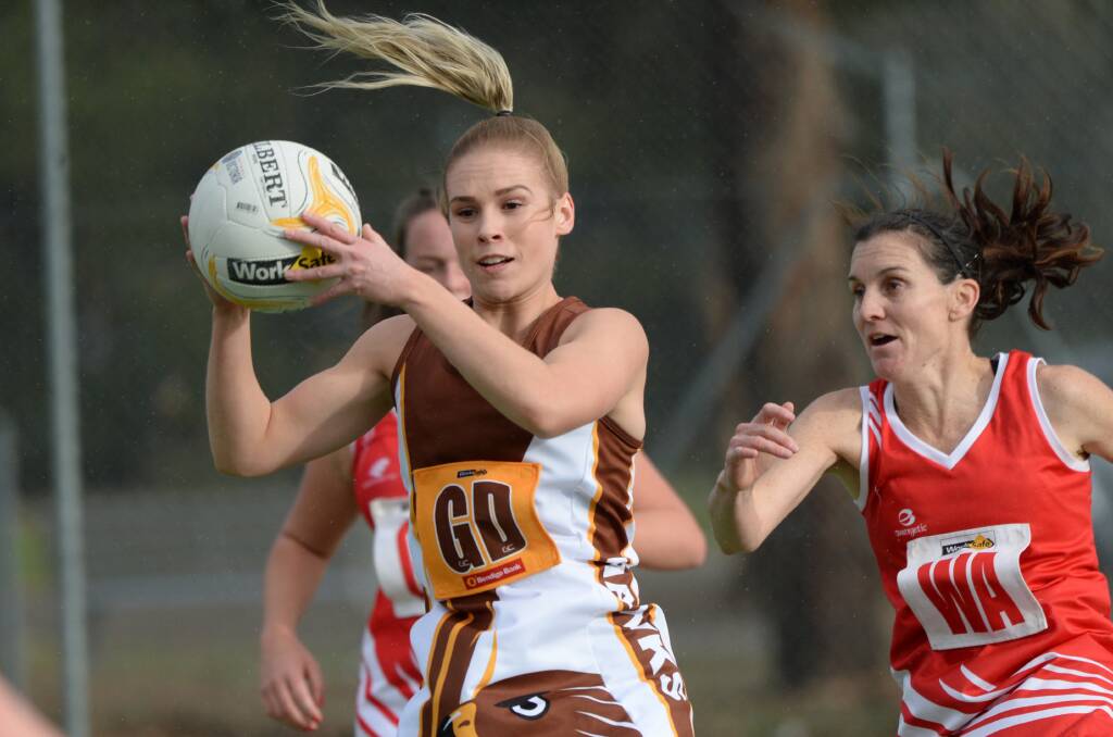 SHOWDOWN: Kaitlyn McPhee and Abbey Hay will be key players for their respective teams in Sunday's elimination final between Huntly and Elmore. The Hawks and Bloods have one win apiece against each other this season. Picture: GLENN DANIELS