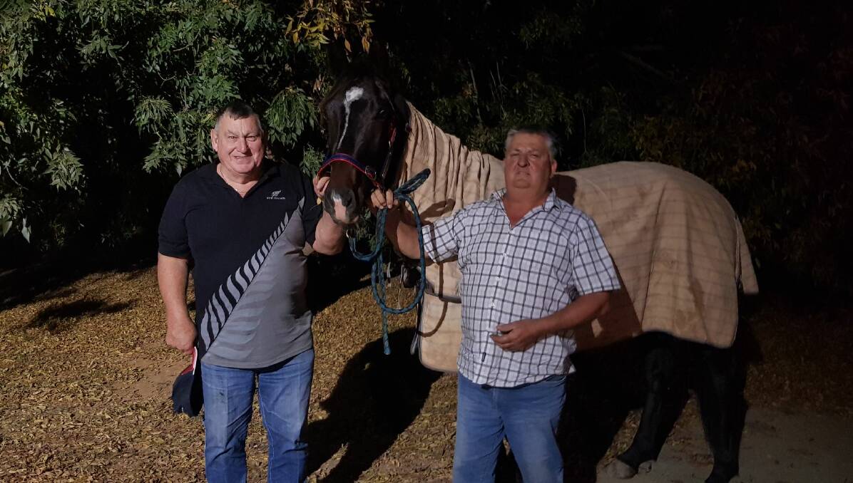 Part owner Denis Pangrazio and trainer Keith Cotchin with Betternbetter after the gelding's win at Maryborough on Wednesday.