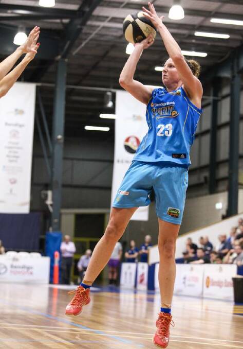 Kelsey Griffin shoots during last year's regular season game against the University of Canberra Capitals. Picture: STEVE BLAKE, AKUNA PHOTOGRAPHY