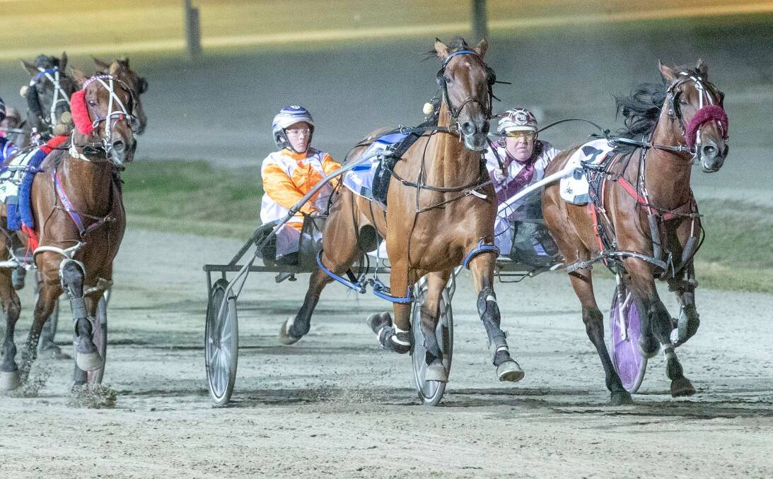 Rebecca Bartley and San Carlo stave off some late challenges to win the Group 2 Bendigo Pacing Cup at Lord's Raceway on Saturday night. Picture: STUART McCORMICK