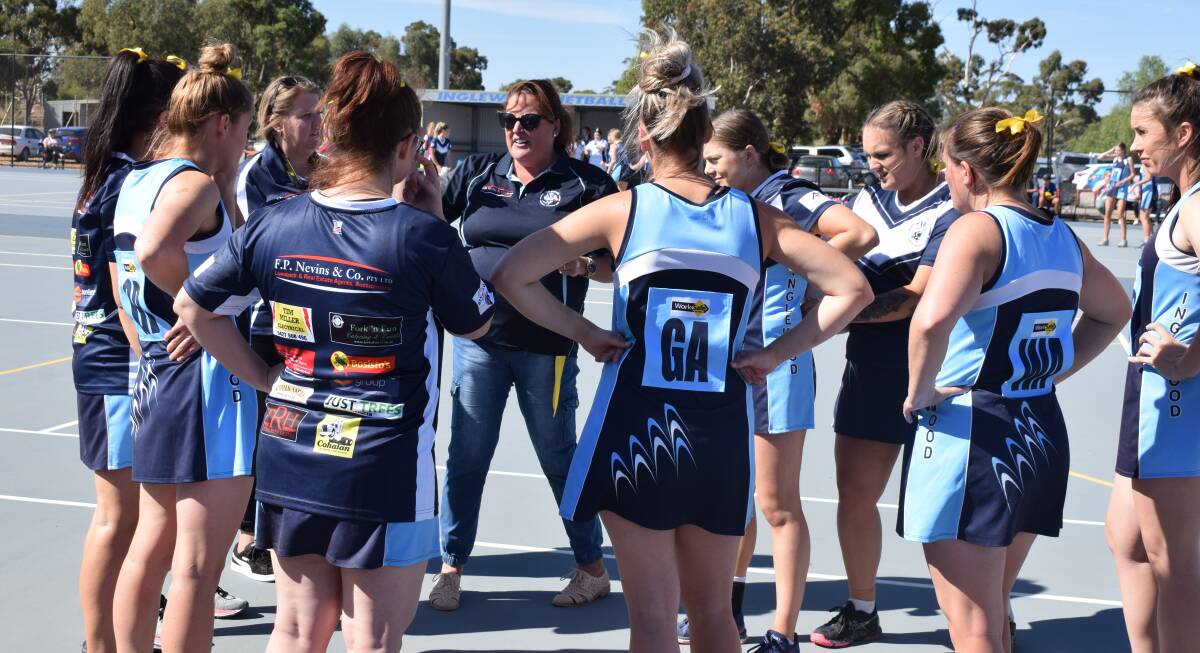 Mandy Burrill-Grinton speaks to her players in the moments before their clash against Marong. Picture: KIERAN ILES