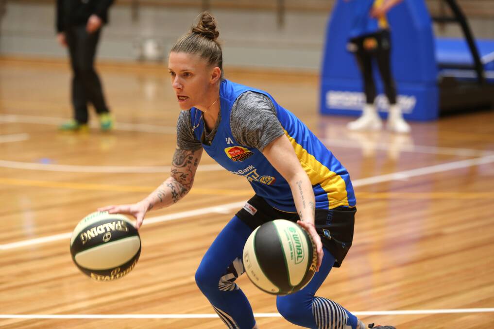 SPIRIT ON THE REBOUND: Natalie Hurst was one of the stars of Bendigo Spirit's practice match win against Perth Lynx in Rockingham on Sunday. Picture: GLENN DANIELS