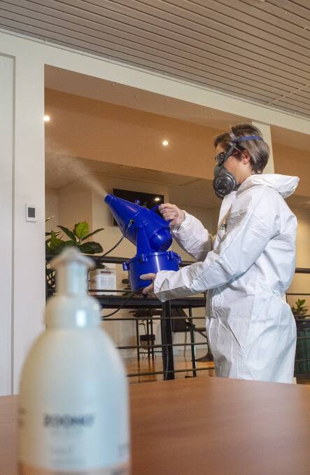 The Silks Function Centre gets a spray with disinfectant courtesy of Tegan Hunter. Picture: DARREN HOWE