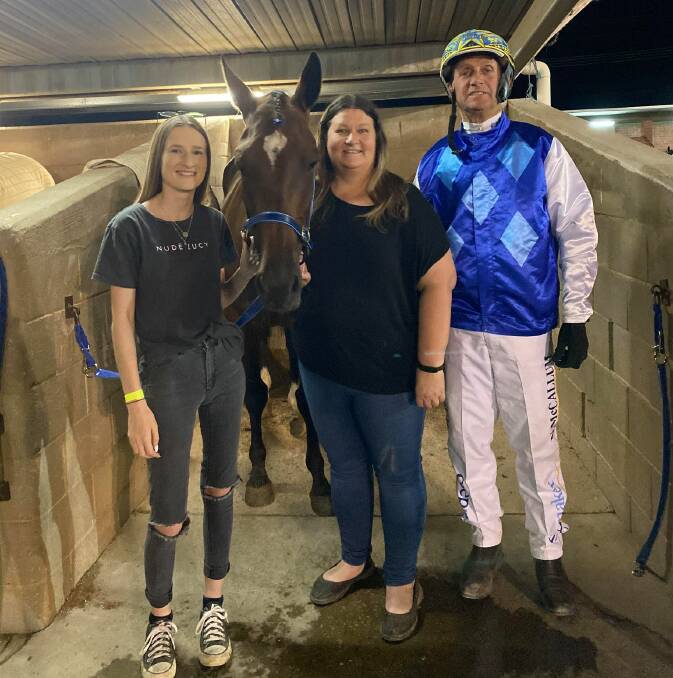 Owners Chelsea and Sharon Prothero and winning driver Neil McCallum are all smiles following Baby Ginnie's win at Mildura's City Oval Paceway on Thursday night. Picture: CHARLI MASOTTI PHOTOGRAPHY
