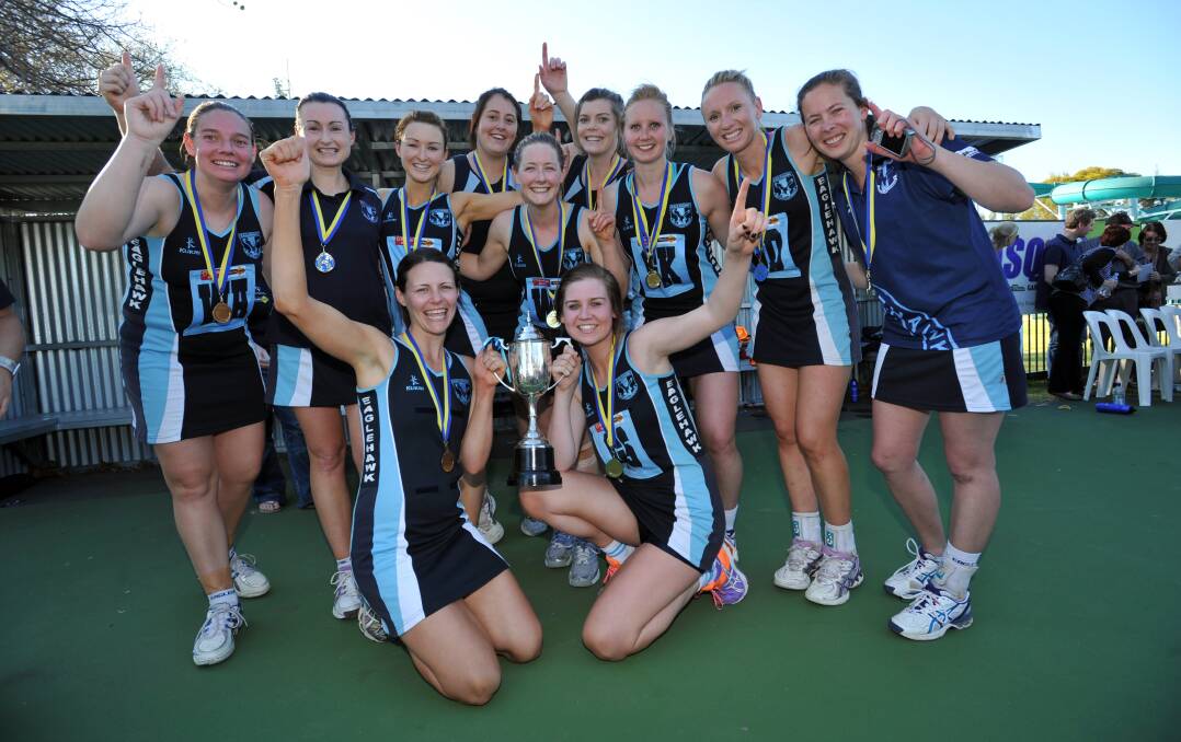 FOND MEMORIES: Abby Gilmore (front right) celebrates an A-grade premiership win with Eaglehawk in 2012.