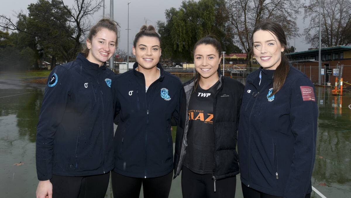 FRIENDS AND RIVALS: Ruby Barkmeyer, Chelsea Sartori, Meg Williams and Abbey Ryan will line up in tonight's VNL division one grand final in Melbourne. Picture: NONI HYETT