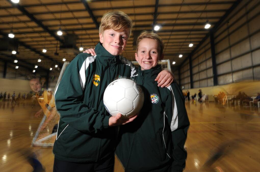 Mac Hilson (right) and Hamish Walker before their futsal trip to the United States in 2016. Picture: NONI HYETT
