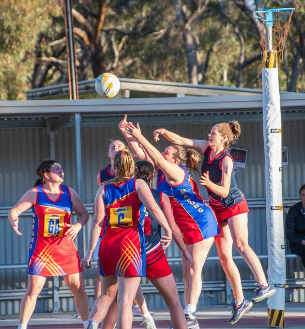 Calivil United's Michelle Balic flies over the top of the pack in Saturday's win over Marong. Picture: ELIZBETH SINCLAIR