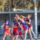 Calivil United's Michelle Balic flies over the top of the pack in Saturday's win over Marong. Picture: ELIZBETH SINCLAIR