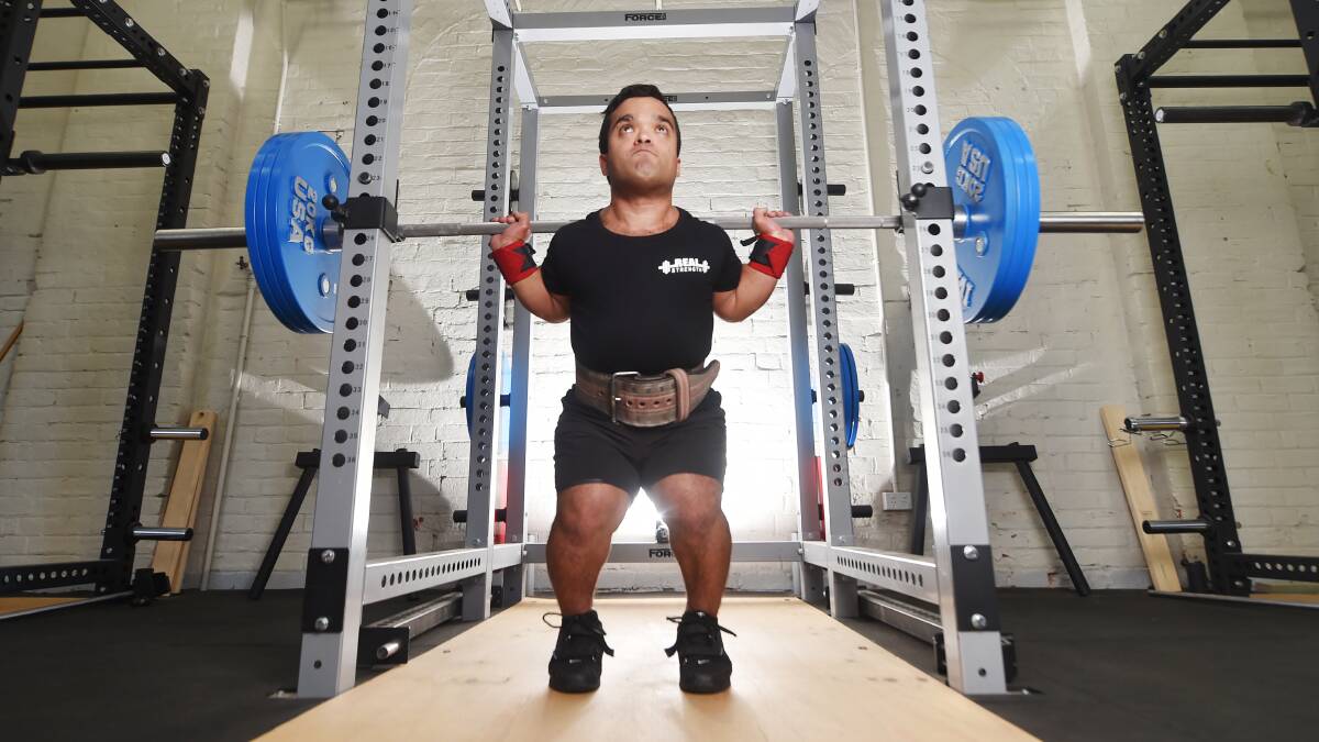 Powerlifting star Kevin Gray is aiming to better his own world record at this month's national open championships in Melbourne. Picture: DARREN HOWE