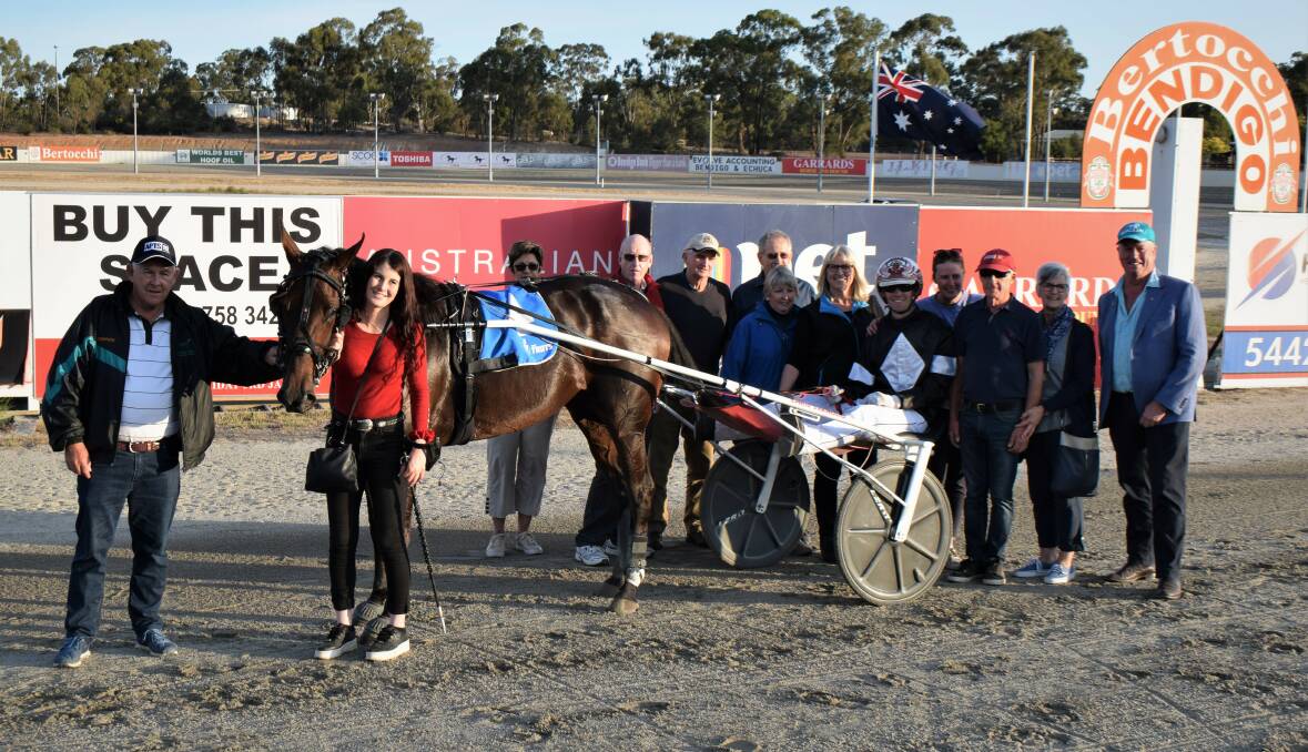 Stable representatives and connections of the Chris Svanosio-trained and driven Norquay celebrate their Lyn McPherson Memorial Breed for Speed Gold Series heat win at Lord's Raceway on Thursday night. Pictured on the right is Team Teal creator Duncan McPherson. Picture: KIERAN ILES