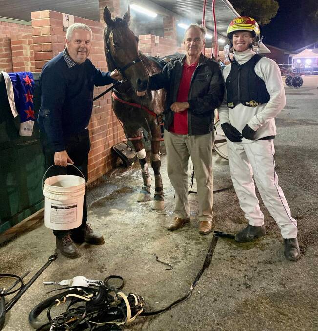 Alan Prentice, from the Pacers Bendigo Syndicate, Gary Donaldson and James Herbertson share success with Rocks Arnt Pets at Mildura last Friday night.