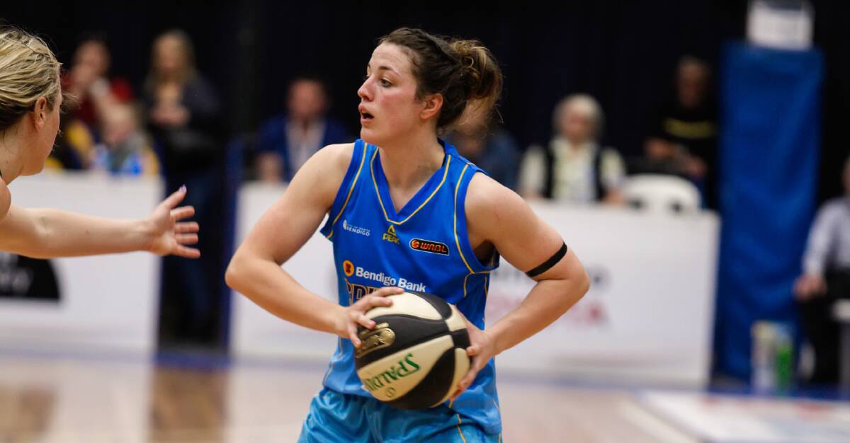 ON FIRE: Kerryn Harrington has continued her outstanding season for Bendigo Spirit, with 13 points and four rebounds in a win in Townsville. Picture: AKUNA PHOTOGRAPHY
