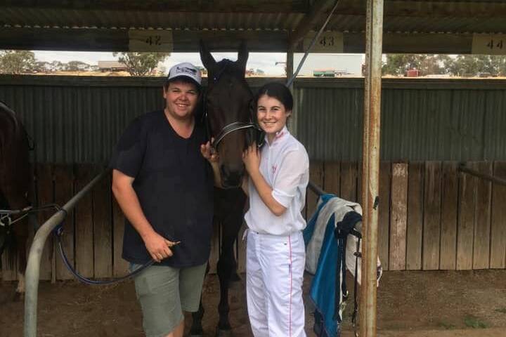 Shaun McNaulty and Michelle Phillips with Gobsmacked, following the three-year-old's previous win at Ouyen last month.