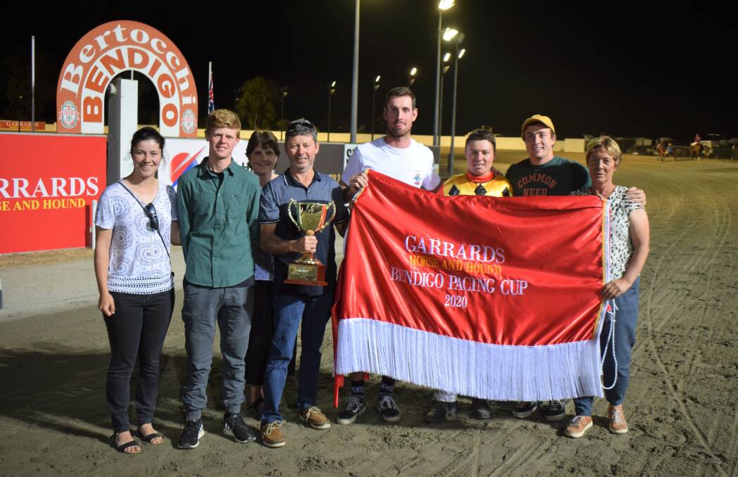 Connections of Code Bailey celebrate their horse's win in the 2020 Bendigo Pacing Cup at Lord's Raceway on Friday night. Picture: KIERAN ILES