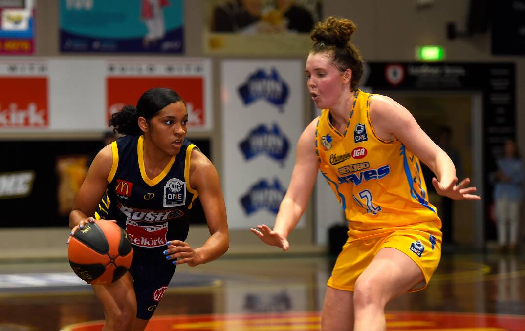 BACK ON COURT: Nadeen Payne defends against Ballarat Rush's Chanise Jenkins during the Braves' 73-55 win on Saturday night at the Minerdome. Picture: ADAM TRAFFORD/BALLARAT COURIER