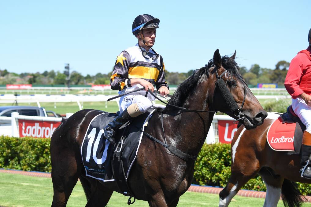 Liam Riordan returns to the mounting yard aboard the victorious Here To Shock. Picture: PAT SCALA/RACING PHOTOS