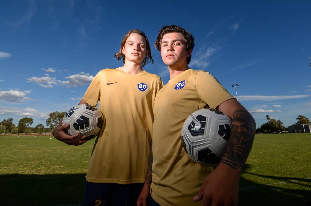 Jake Floyd, 17, and Luke Burns, 21, couldn't be more excited to see Bendigo City FC fielding senior teams in the Men's State League competition next season. Picture: DARREN HOWE