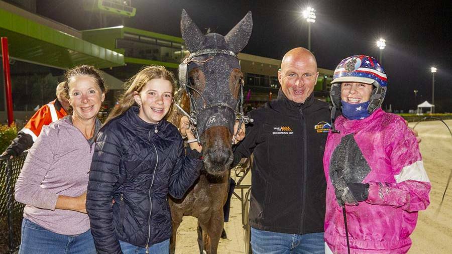 Maree, Holi and Paul Campbell with driver Kerryn Manning after Sunofatrump's win at Melton in January. Picture: STUART McCORMICK