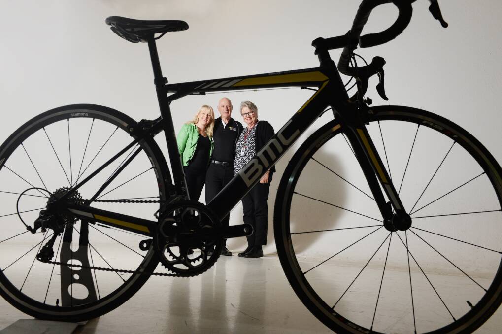 TEAM: The OTIS Foundation's Rachel Mason, Bendigo Cycling Classic Chairman Geoff O'Sullivan and Bendigo Health Foundation's Jane Anderson.