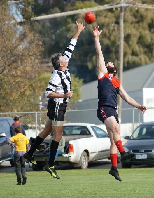 MILESTONE: Nathan Gooding in action against Wycheproof-Narraport. The popular clubman will play his 350th game this weekend against Wedderburn.