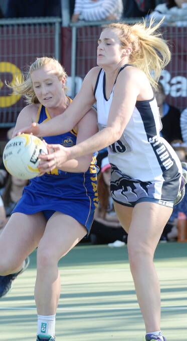 Allira Holmes and Claudia Powell fight for the ball on grand final day.