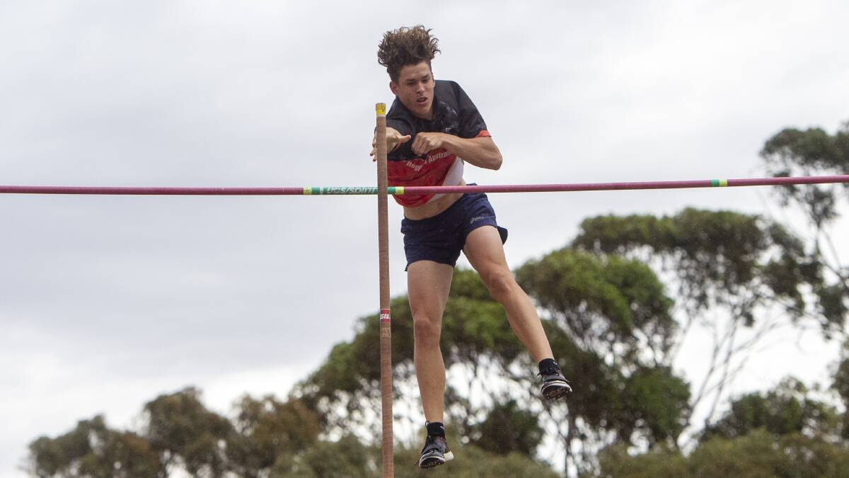 James Woods set a new centre record in the under-17 to open pole vault on Saturday. Picture: DARREN HOWE
