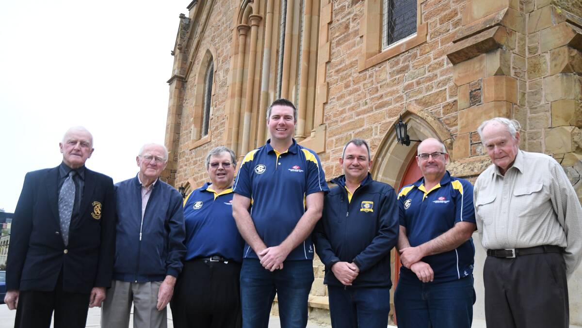 Members of the Bendigo Cricket Club 125 Not Out Celebration organising committee and club stalwarts Ernie Lowndes, Jack Runnalls, Gary Piggottt, Travis Windridge, Andrew Gibbs, Peter Kelly and Doug Laity gather outside the former Methodist church in Forest Street, Bendigo. The Goers were once known as Forest Street Methodist Comrades. Picture: KIERAN ILES