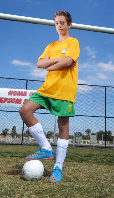 Lewis Dunne is proud to be wearing th Australian colours overseas. Picture: DARREN HOWE