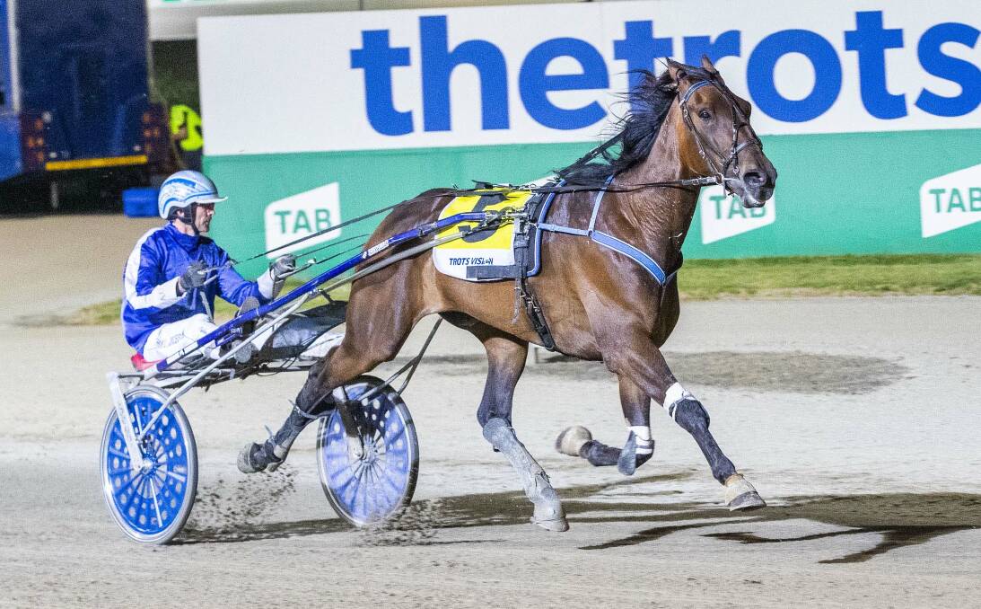 Rules Dont Apply and Anthony Crossland power to an emphatic Vicbred Super Series heat win at Tabcorp Park Melton on Tuesday night. Picture: STUART McCORMICK