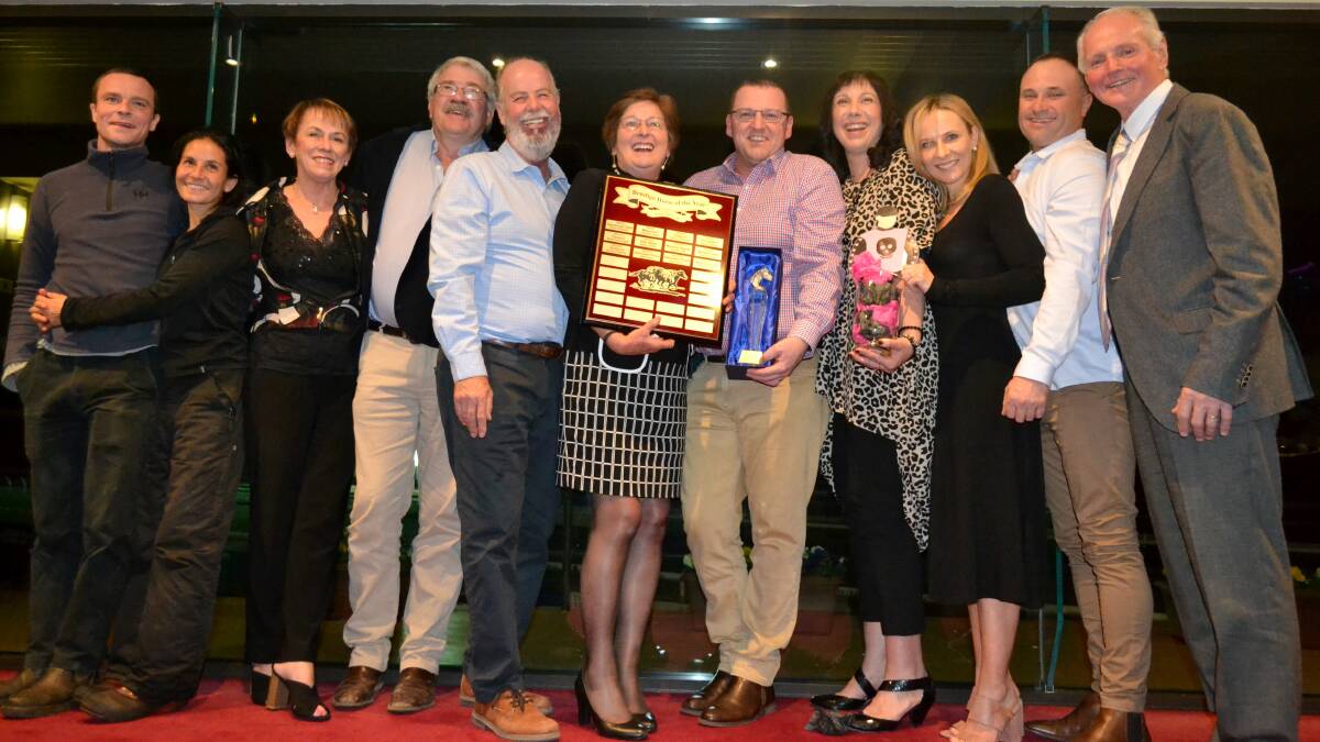 Connections of Miss Leonidas, including trainer Shaun Dwyer (far right), celebrate the mare's Bendigo Horse of the Year award win in August.