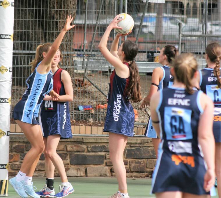 AIMING HIGH: Best on court in last season's 17-and-under grand final, Sandhurst's Sahara Rodda shoots for goal in earlier season contest against Eaglehawk at the QEO. Picture courtesy of SANDHURST FOOTBALL NETBALL CLUB