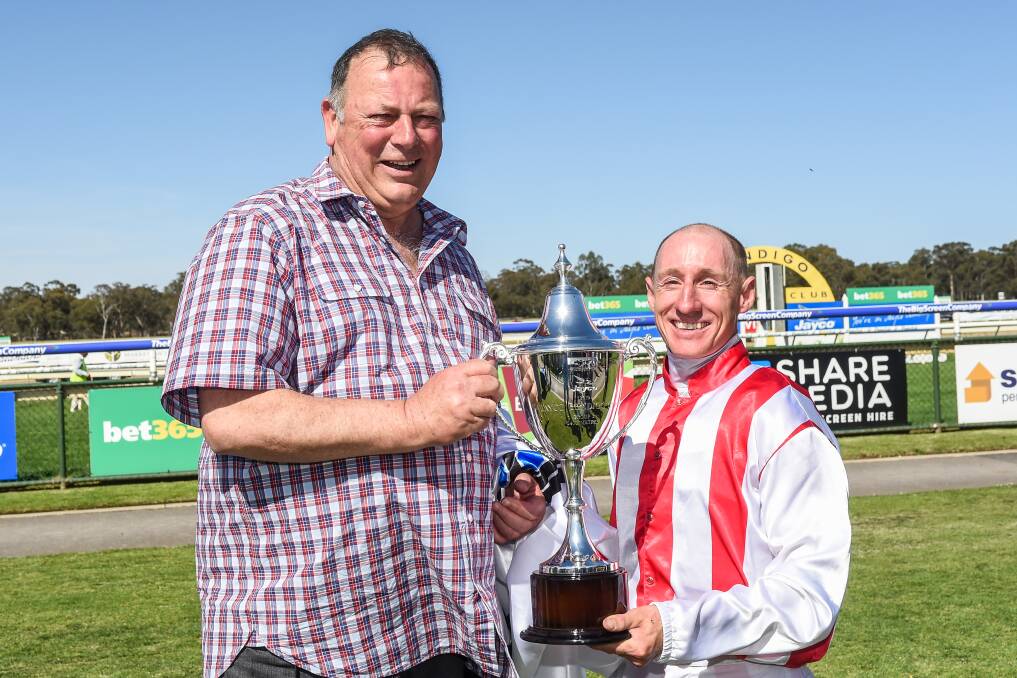 Trainer Michael Moroney and jockey William Pike celebrate following Top Of The Range's Bendigo Cup win in 2019. Picture: BRETT HOLBURT/RACING PHOTOS
