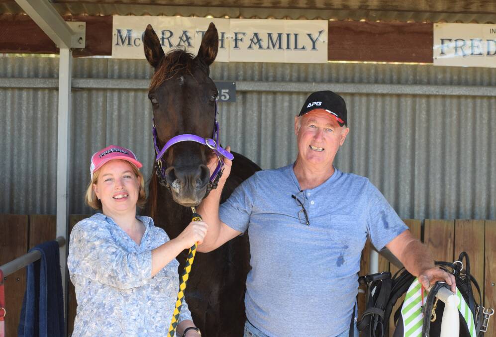 Strapper Dixie Horig and trainer Greg Norman with a victorious Fiftyshadesofhay. Picture: KIERAN ILES