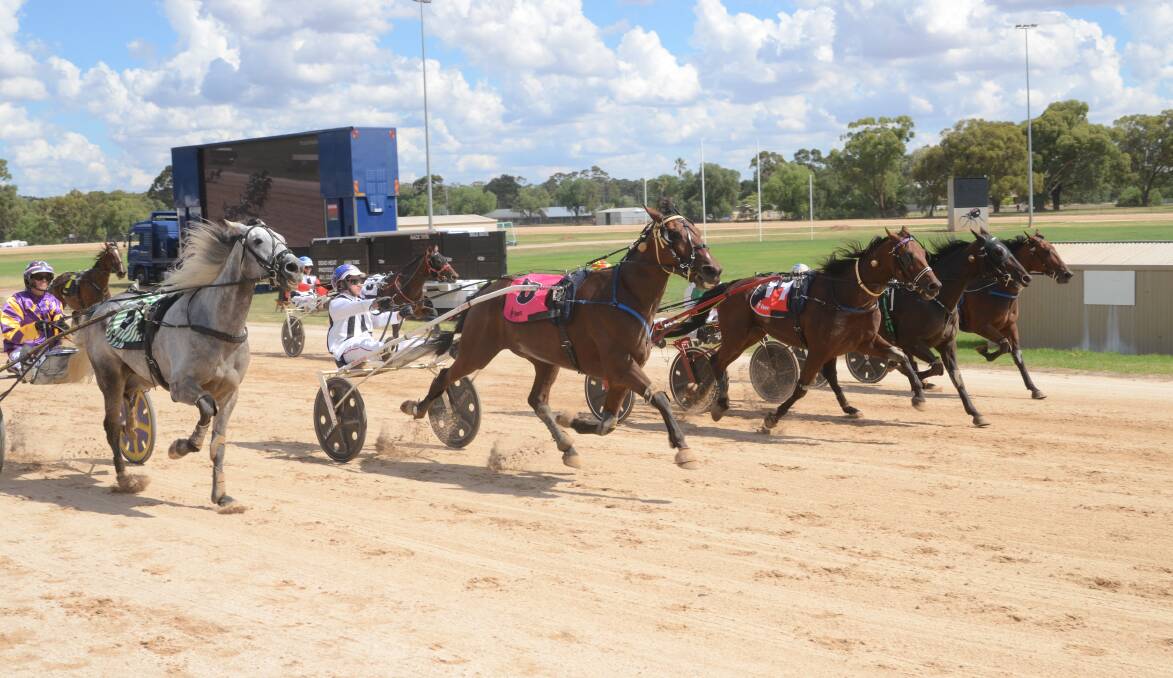 Chissy, driven by Ryan Sanderson in the black and white colours of former trainer Frank Evans, storms to victory in the $14,500 Wedderburn Trotters Cup on Sunday. Picture: GEOFFREY DERN
