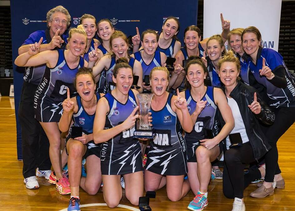 Stewart and Fowler celebrate premiership glory with their Melbourne University Lightning team-mates in 2016. Picture: GRANT TREEBY