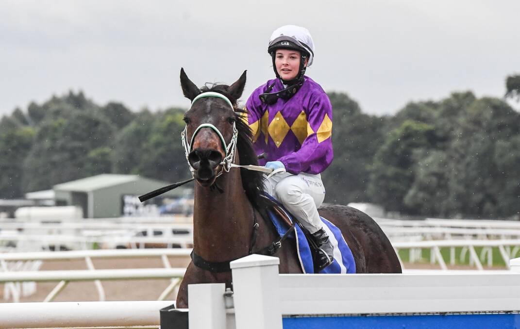 Rose Hammond returns to the mounting yard on Equine Philosopher at Ballarat Synthetic on Tuesday. The 20-year-old apprentice has ridden the five-year-old gekding in each of his last three wins. Picture by Brett Holburt/Racing Photos
