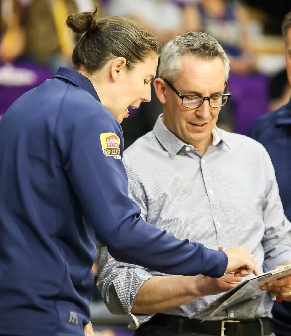 Coach Simon Pritchard and assistant Megan Moody plot Melbourne Boomers' downfall from the sidelines during Saturday night's season opener. Picture: CRAIG DILKS PHOTOGRAPHY