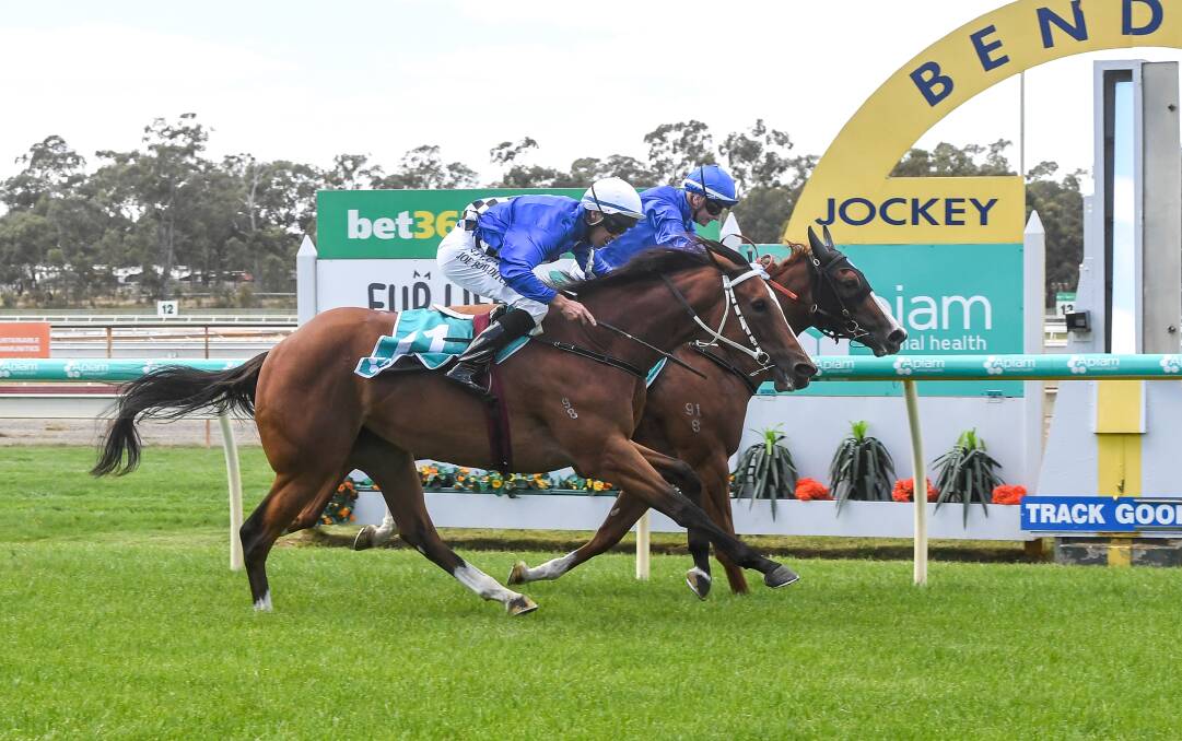 Cloudy (inside), ridden by Jamie Kah, dead heats with Seradess, ridden by Joe Bowditch, in the Roll the Dice Racing 2YO Fillies Maiden Plate at Bendigo on Tuesday. Picture: BRETT HOLBURT/RACING PHOTOS