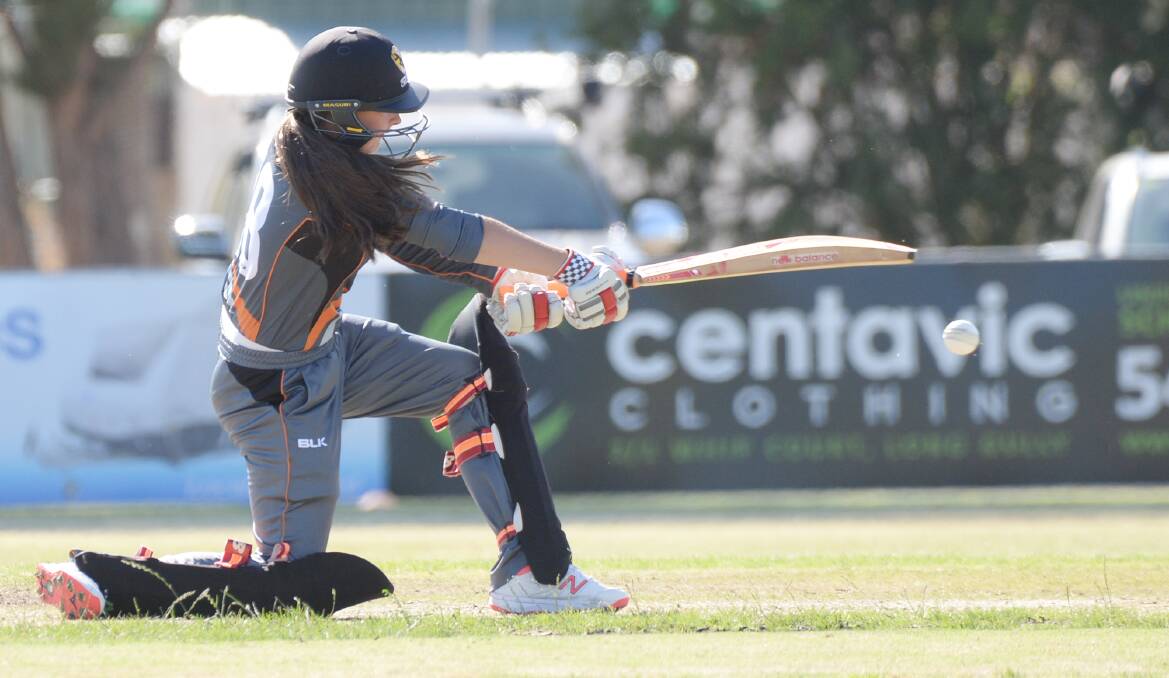 Northern Territory top order batsman Rianna Carlson hits out during her innings of seven against Victoria Country at Kangaroo Flat on Monday. Picture: DARREN HOWE